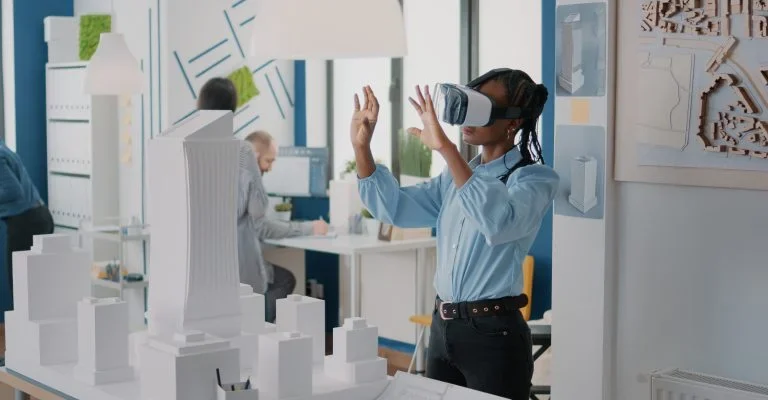 architect-using-vr-glasses-design-building-model-construction-layout-woman-contractor-working-with-virtual-reality-headset-plan-real-estate-structure-creating-urban-project-768x432