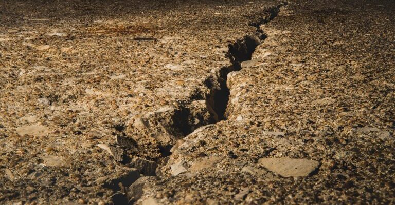 split-ground-covered-stones-sunlight-1-768x512