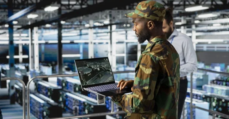 black-army-technology-specialist-troubleshooting-military-pc-systems-768x512
