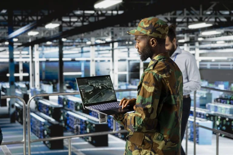 black-army-technology-specialist-troubleshooting-military-pc-systems-768x512
